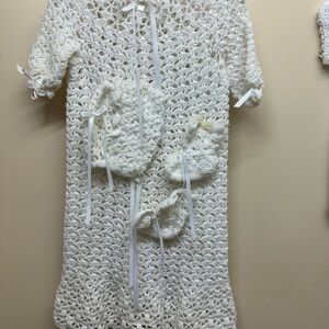 Two hand crocheted outfits with a One crocheted blanket
With a Pearl White Yarn